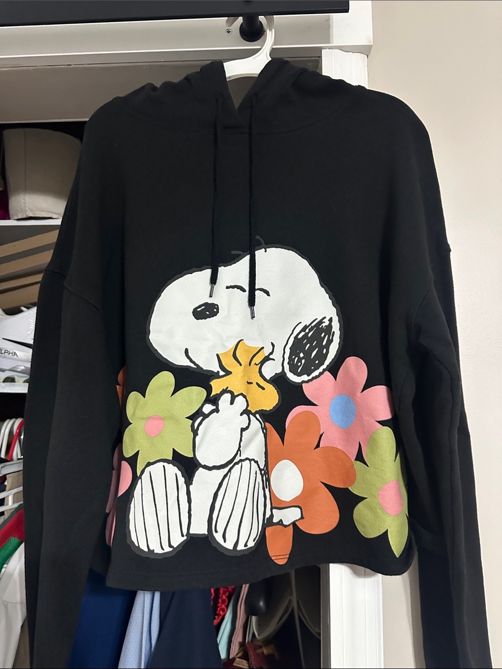 Peanuts Black Hoodie with Snoopy and Bright Floral Accents